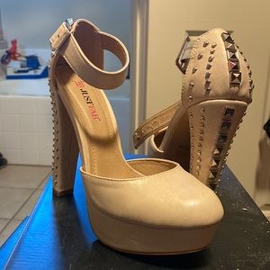 Just Fab heels. worn once years ago which is probably why the strap is peeling.